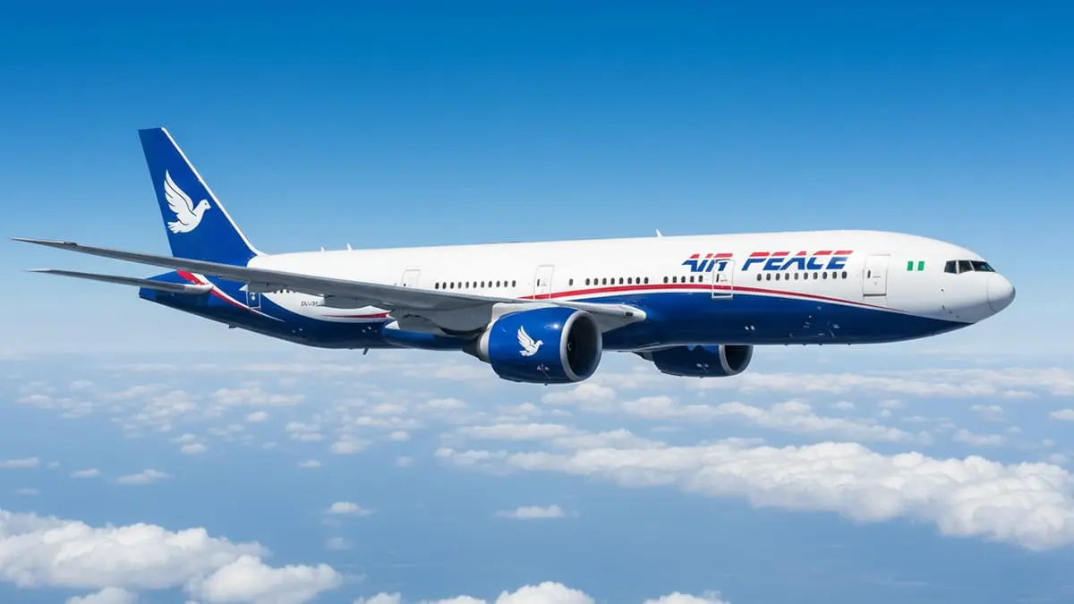 Air Peace’s plane is flying in the sky.