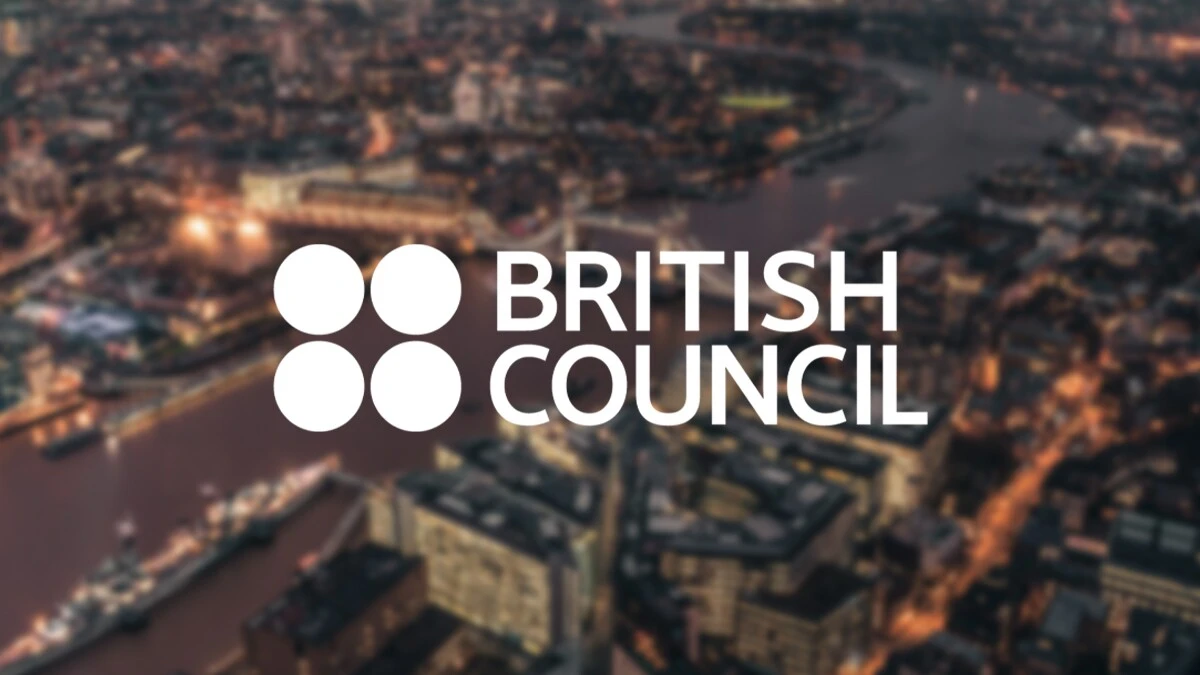 British Council logo on a blurred image of London city.